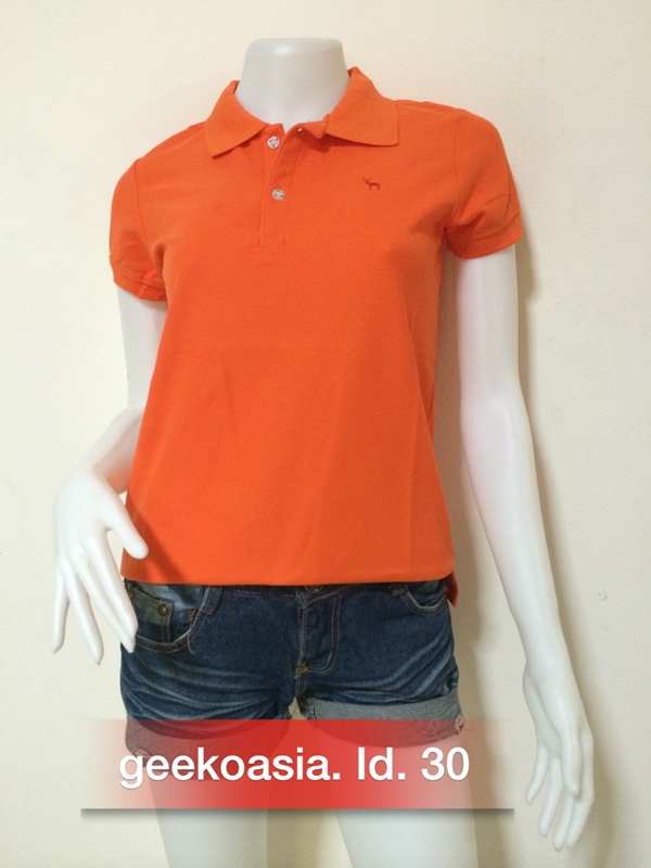 เสื้อโปโลสีพื้นหญิง ส้มกลาง