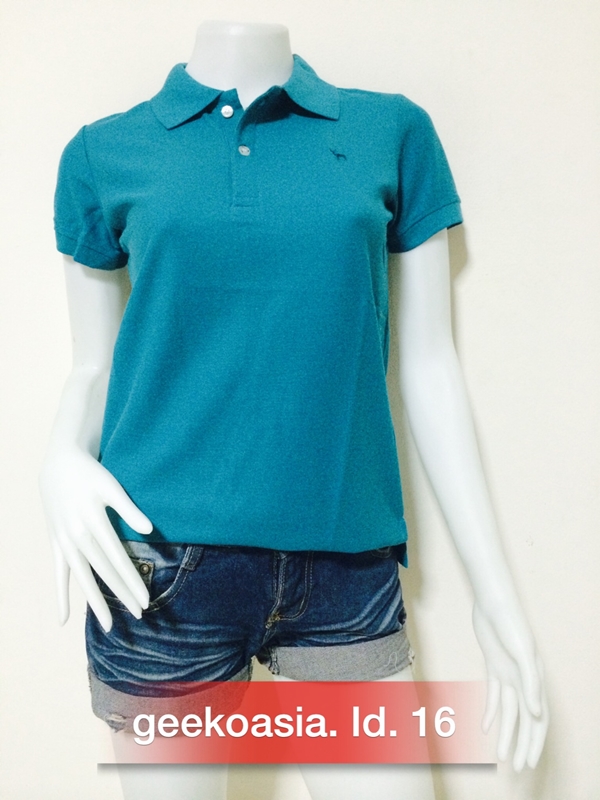 เสื้อโปโลหญิงสีเขียวมรกต