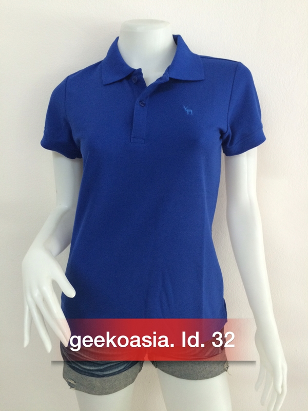 เสื้อโปโลหญิงสีน้ำเงินสด