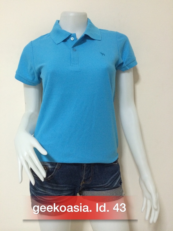 เสื้อโปโลผู้หญิงสีฟ้ากลาง
